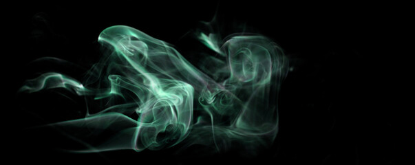 Fototapeta premium green isolated smoke on black background