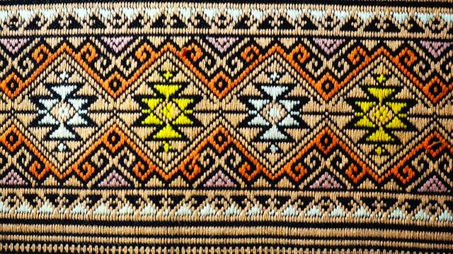 4K More than 100 years old colorful thai handcraft peruvian style rug surface old vintage torn conservation Made from natural materials Chemical free close up