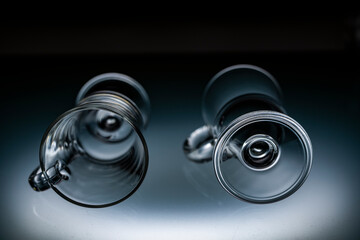 glassware for tea mulled wine coffee illuminated by light from below on frosted glass