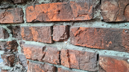 Obraz premium Texture of old red brick wall close-up.