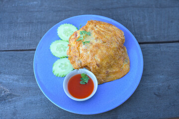 Closeup of a simple egg omelet with herbs