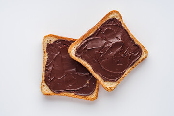 toasts with chocolate butter on a white acrylic background