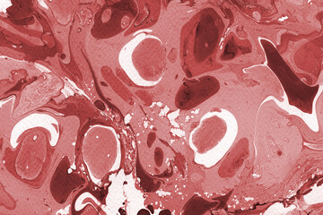 Red marble ink texture on watercolor paper background. Marble stone image. Bath bomb effect. Psychedelic biomorphic art.