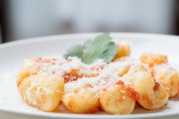 gnocchi pasta close-up, a plate of gnocchi with ragù