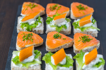 sandwiches with salmon and  surimi