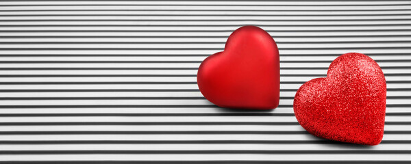 Two red hearts and black white background