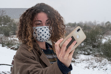 Selfie in the middle of snow. Covid protections.