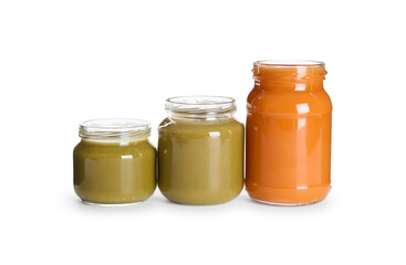 Jars with healthy baby food on white background