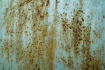 rust texture on green-blue paint