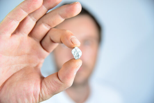 silver nugget in hand