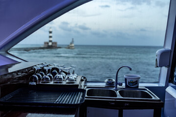 an ancient lighthouse stands in the middle of trade sea routes in the Red Sea