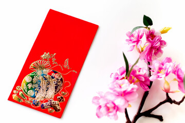 Red envelope put on white background, red envelope is gift,  blossom on special days such as chinese new year,