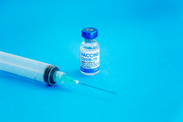 Covid-19 Corona Virus 2019-ncov vaccine vials medicine drug bottles syringe injection. Vaccination,...