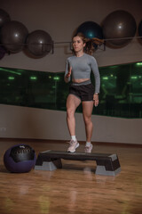 Fototapeta na wymiar Female in the middle of a quick HIIT cardio for better looking shape