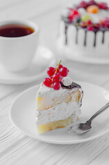 Appetizing cake with chocolate and fresh berries.