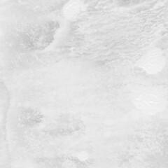 White ink and watercolor texture on white paper background. Paint leaks and decalcomania effects. Hand-painted gouache abstract image. Mess on the canvas.