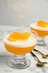 Delicious tangerine jelly on white marble table