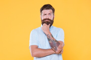 Just fabulous hair. confident and handsome brutal man. charismatic guy looking serious. male barber...