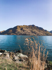 view of the mountains from lake, Queenstown, New Zealand