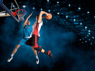 Two basketball players in arena. Blocked shot - 404289193