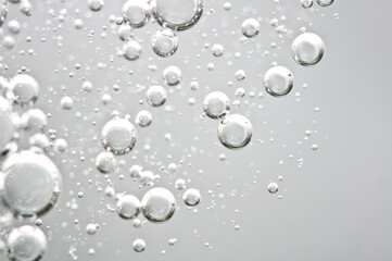 Bubbles from soda water or champagne, beer or other liquid with air, oxygen or carbon dioxide...