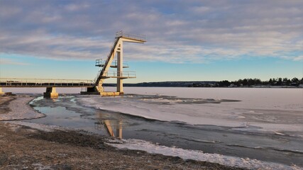 Diving board over a freezing fjord