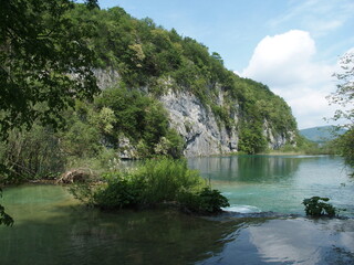 Fototapeta na wymiar Plitvice Lakes National Park in Croatia offers unspoiled and unique nature full of lakes, rivers and waterfalls