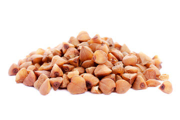 Pile of buckwheat seeds isolated on white background, closeup. Buckwheat seeds isolated on white. Buckwheat grains isolated on white background, close-up. Buckwheat for porridge.