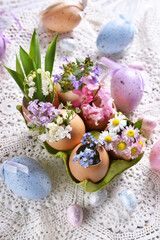 Easter decoration with spring flowers in egg shells