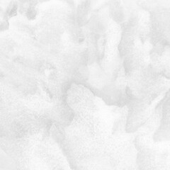 White ink and watercolor texture on white paper background. Paint leaks and decalcomania effects. Hand-painted gouache abstract image. Mess on the canvas.
