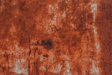 Rusty metal sheet with cracked paint. Texture of rust. Natural rusty background.