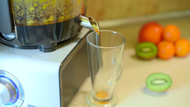 Making juice in a juicer
