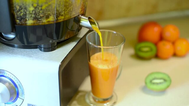 Making juice in a juicer
