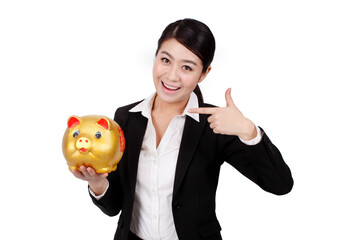 A Busines swoman holding a piggy bank 