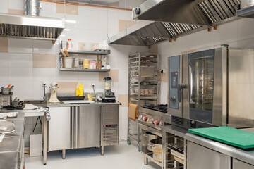 General plan of restaurant's kitchen without people. Confectionery shop in a cafe or restaurant. Confectioners or bakers kitchen. Concept - working as a baker in a restaurant. Pastry chef career.