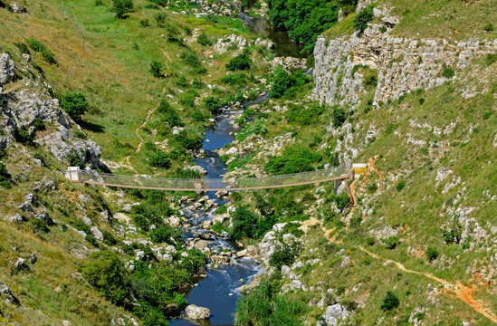 suspension bridge in the ravine Gravina di Matera, Italy