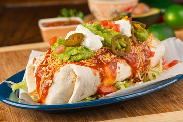 Burritos or tacos. Mexican or Tex-Mex food favorite. Seasoned meat, refried or black beans, Mexican rice, cheese, fried vegetables wrapped in homemade tortillas and served with salsa. Takeout favorite