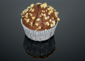 chocolate muffin on a black background