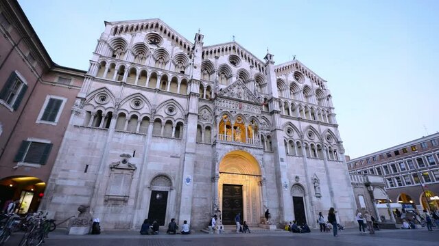 Ferrara, Italy - August 29, 2015 Estense Castle.Festival Baskers, Estense castle stands near a group of guys