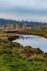 Fototapeta na wymiar A View along the River Ouse near Lewes in Sussex, on a Sunny WInters Day