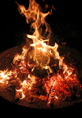 Bonfire. Fire on black. Brightly, heat, light, camping.