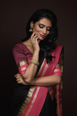 Beautiful Indian woman wearing traditional sari dress