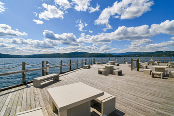 An expansive deck along Lake Coeur d'Alene, part of the world's longest floating boardwalk at the resort at Coeur d'Alene, Idaho, USA