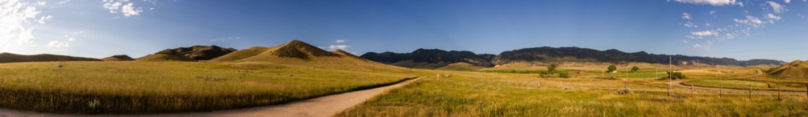 Panorama shot of fay road to mountains in america countryside nature