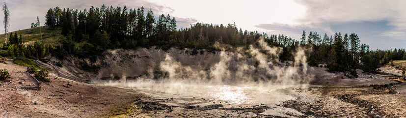 Panorama shot of boiling mud caldron in yellowstone national park in america