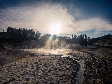 Wide shot of boiling mud caldron in yellowstone national park in america