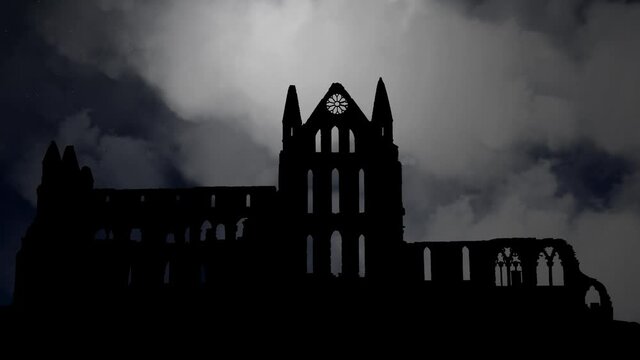 Whitby Abbey Castle By Night with Crescent Moon and Ruined Gothic Church in Silhouette , England