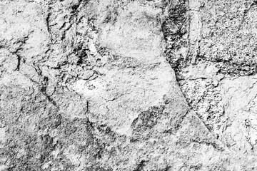 Texture of a concrete wall with cracks and scratches which can be used as a background