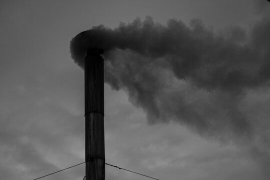Black fmo coming out of a chimney