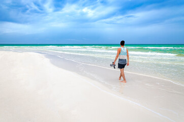 young boy walking on caribbean beach - Riviera Maya, Yucatan, Mexico - obrazy, fototapety, plakaty
